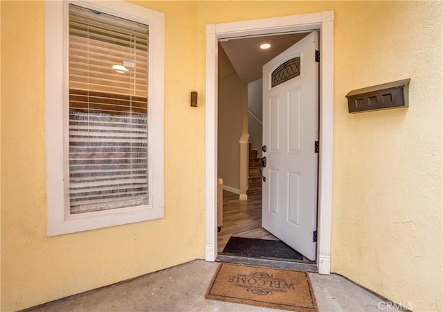 10105 S Main St, Los Angeles, CA 90003 - doorway to property featuring stucco siding