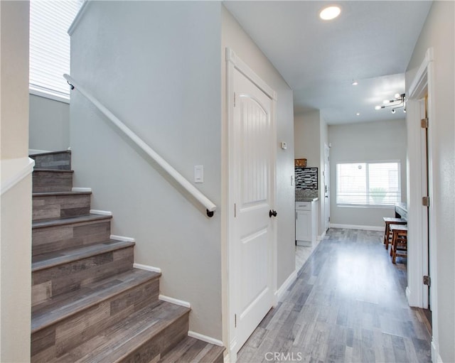10105 S Main St, Los Angeles, CA 90003 - stairs with wood finished floors and recessed lighting