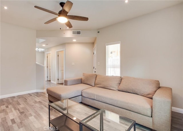 10105 S Main St, Los Angeles, CA 90003 - living room featuring wood finished floors, a ceiling fan, and recessed lighting