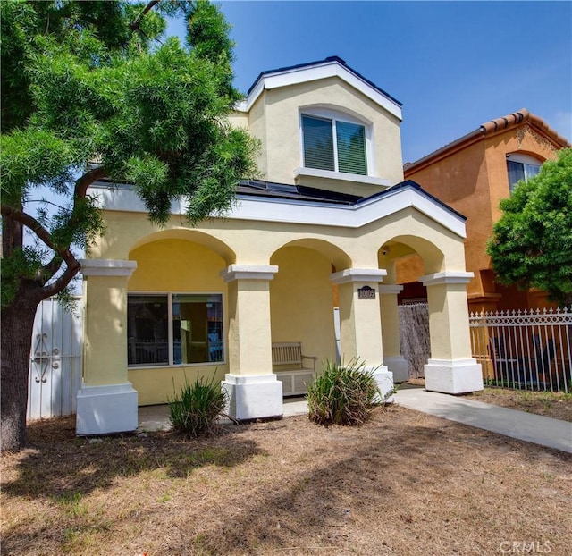 10105 S Main St, Los Angeles, CA 90003 - back of house featuring stucco siding and covered porch