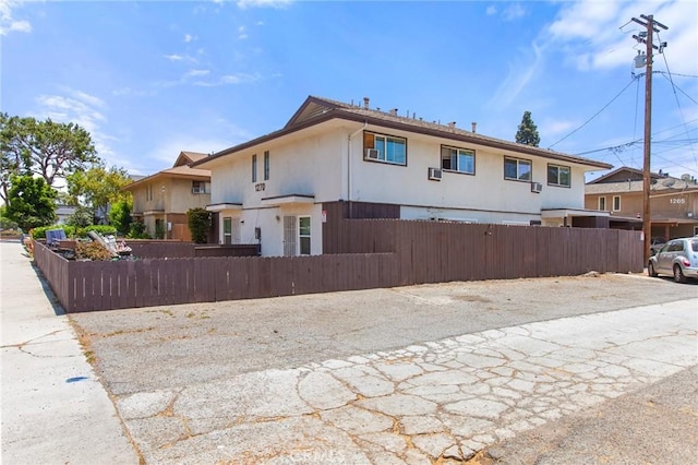 1270 W 9th St, Corona, CA 92882 - view of side of property featuring stucco siding