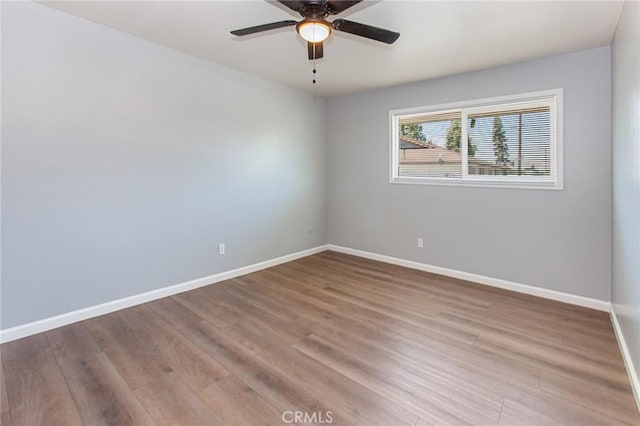 1270 W 9th St, Corona, CA 92882 - empty room featuring wood finished floors and a ceiling fan