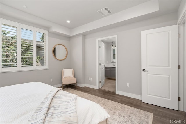 712 S Marengo Ave Unit 3, Pasadena, CA 91106 - bedroom featuring wood finished floors, recessed lighting, and ensuite bathroom