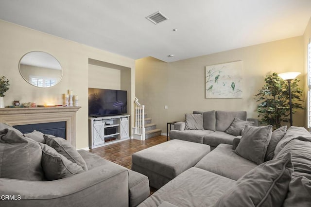 3366 Shadetree Way, Camarillo, CA 93012 - living room featuring stairway and a glass covered fireplace