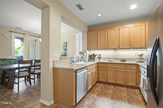 3366 Shadetree Way, Camarillo, CA 93012 - kitchen with appliances with stainless steel finishes, stone finish floors, recessed lighting, and light brown cabinetry