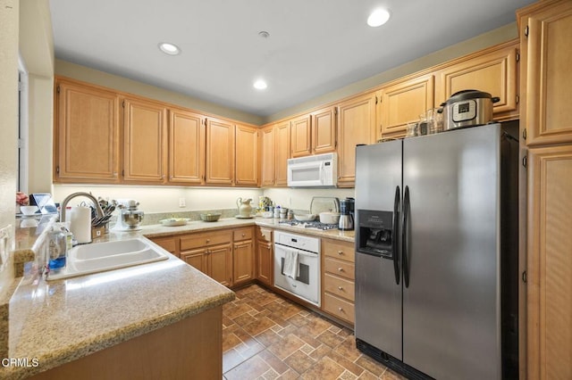 3366 Shadetree Way, Camarillo, CA 93012 - kitchen with white appliances, light countertops, light brown cabinetry, and recessed lighting