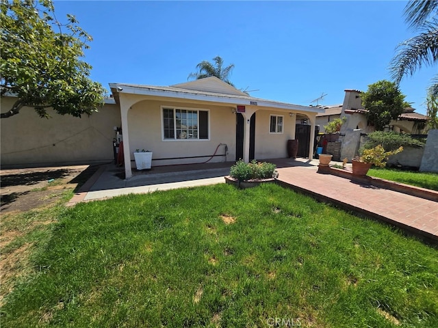 15768 Amar Rd, La Puente, CA 91744 - ranch-style house featuring stucco siding and a patio area