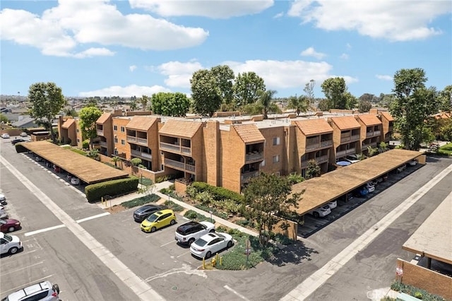6600 Warner Ave Unit 144, Huntington Beach, CA 92647 - view of property with uncovered parking and a residential view