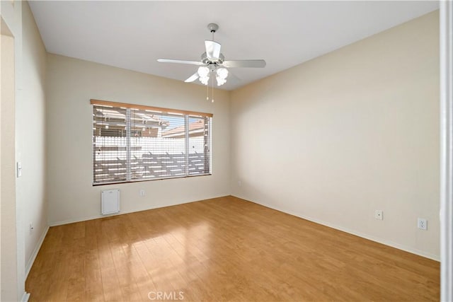 27812 Ruggie Rd, Menifee, CA 92585 - spare room featuring wood finished floors and a ceiling fan