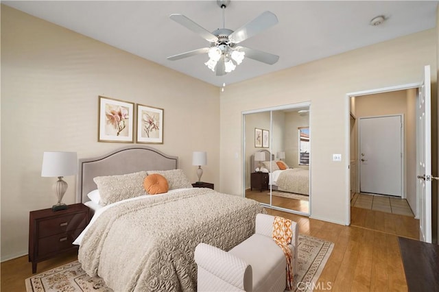 27812 Ruggie Rd, Menifee, CA 92585 - bedroom featuring wood finished floors, a closet, and a ceiling fan