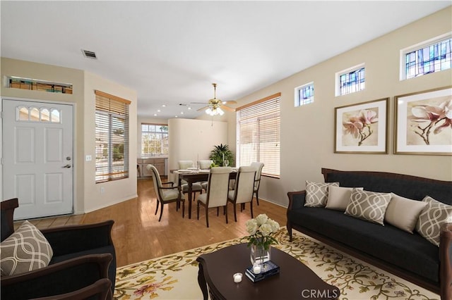 27812 Ruggie Rd, Menifee, CA 92585 - living room with healthy amount of natural light, wood finished floors, recessed lighting, and a ceiling fan