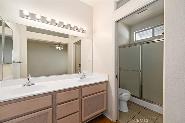 27812 Ruggie Rd, Menifee, CA 92585 - bathroom with double vanity, a shower with door, tile patterned floors, and ceiling fan