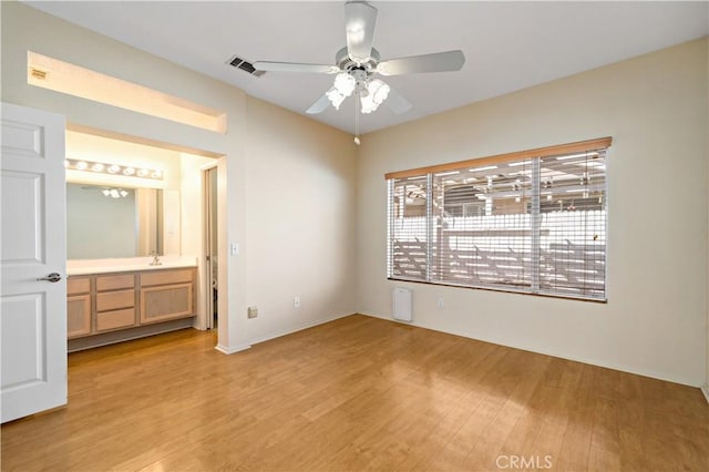 27812 Ruggie Rd, Menifee, CA 92585 - unfurnished bedroom with light wood-style flooring and ceiling fan