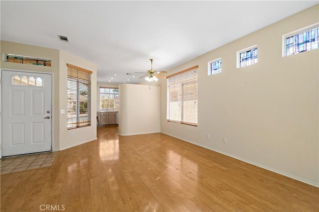 27812 Ruggie Rd, Menifee, CA 92585 - entryway featuring light wood-style floors, plenty of natural light, ceiling fan, and recessed lighting
