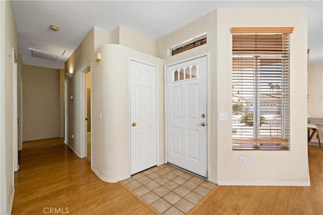 27812 Ruggie Rd, Menifee, CA 92585 - foyer with light wood-style flooring and baseboards