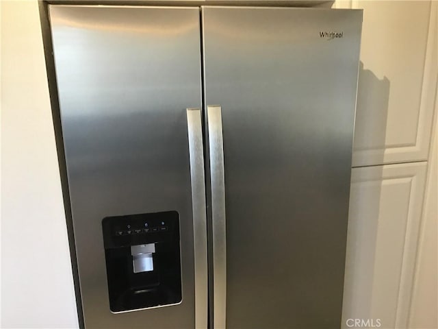 9144 Oakleaf Ct, Hesperia, CA 92344 - kitchen view of stainless steel refrigerator with ice dispenser