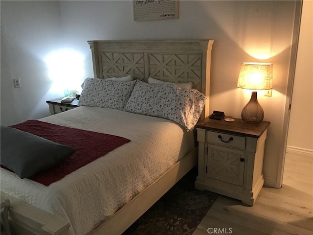 9144 Oakleaf Ct, Hesperia, CA 92344 - bedroom with light wood-type flooring and baseboards