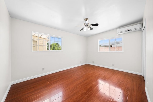 2047 Delford Ave, Duarte, CA 91010 - empty room featuring a wall mounted AC, wood finished floors, and a ceiling fan