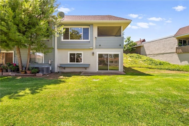 22271 Caminito Danubo, Laguna Hills, CA 92653 - back of property featuring a lawn and stucco siding