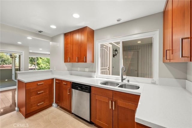 22271 Caminito Danubo, Laguna Hills, CA 92653 - kitchen featuring stainless steel dishwasher, a peninsula, light countertops, brown cabinets, and recessed lighting