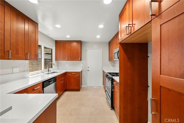 22271 Caminito Danubo, Laguna Hills, CA 92653 - kitchen with appliances with stainless steel finishes, brown cabinetry, recessed lighting, and light countertops