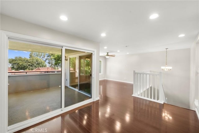22271 Caminito Danubo, Laguna Hills, CA 92653 - unfurnished room with wood finished floors, recessed lighting, ceiling fan, and a chandelier
