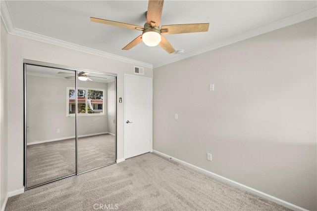 22271 Caminito Danubo, Laguna Hills, CA 92653 - unfurnished bedroom featuring carpet flooring, a closet, crown molding, and ceiling fan