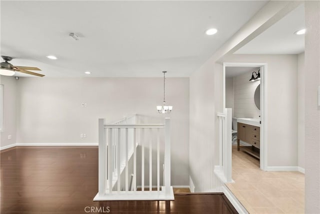22271 Caminito Danubo, Laguna Hills, CA 92653 - hall with recessed lighting, a chandelier, and wood finished floors