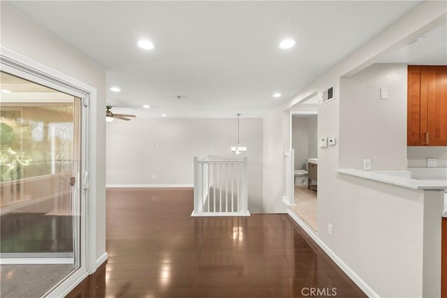 22271 Caminito Danubo, Laguna Hills, CA 92653 - hall with recessed lighting, dark wood-style flooring, and a chandelier