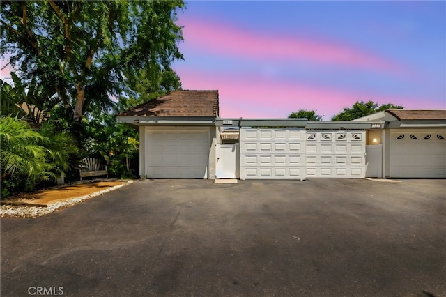22271 Caminito Danubo, Laguna Hills, CA 92653 - view of garage at dusk