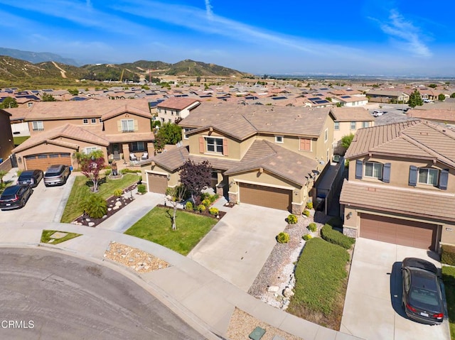4069 Bristlecone Pine Ln, San Bernardino, CA 92407 - aerial view of residential area featuring a mountainous background