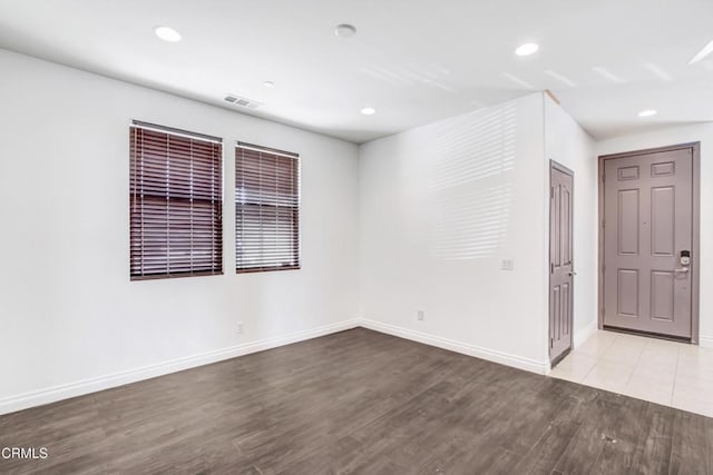 4069 Bristlecone Pine Ln, San Bernardino, CA 92407 - unfurnished room with wood finished floors and recessed lighting