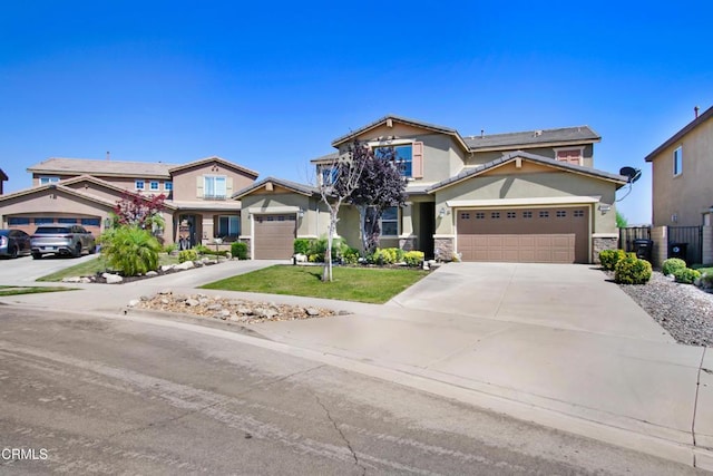 4069 Bristlecone Pine Ln, San Bernardino, CA 92407 - view of front of property with concrete driveway, stucco siding, stone siding, and an attached garage
