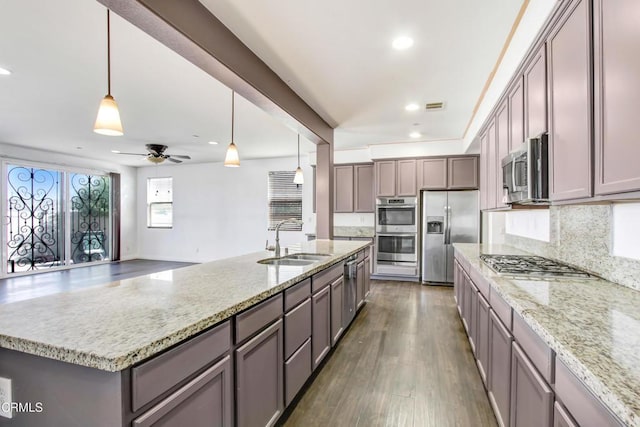4069 Bristlecone Pine Ln, San Bernardino, CA 92407 - kitchen featuring stainless steel appliances, recessed lighting, gray cabinets, light stone countertops, and a ceiling fan
