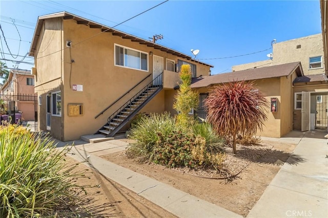 841 Cherry Ave, Long Beach, CA 90813 - view of front of house with stucco siding and stairs