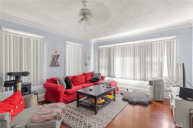 841 Cherry Ave, Long Beach, CA 90813 - living room with ornamental molding, a ceiling fan, wood finished floors, and a textured ceiling