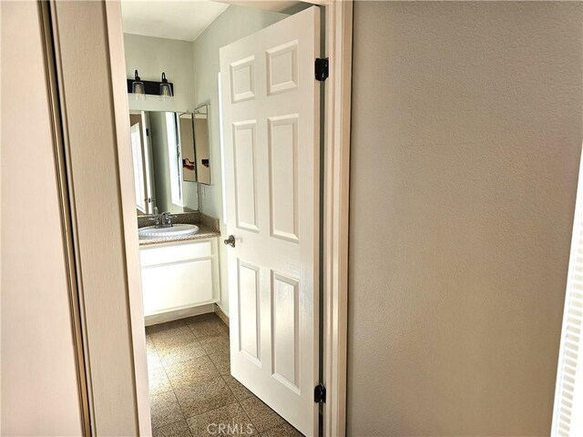 6801 Mammoth Ave Unit 6, Van Nuys, CA 91405 - bathroom featuring granite floors and vanity