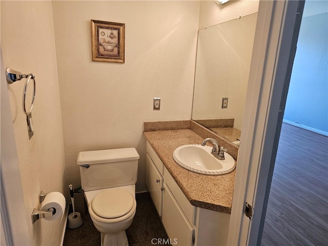 6801 Mammoth Ave Unit 6, Van Nuys, CA 91405 - half bath featuring vanity and wood finished floors