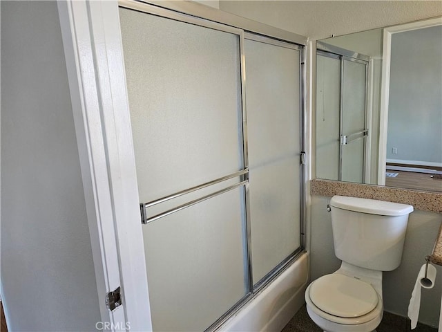 6801 Mammoth Ave Unit 6, Van Nuys, CA 91405 - bathroom featuring toilet and combined bath / shower with glass door