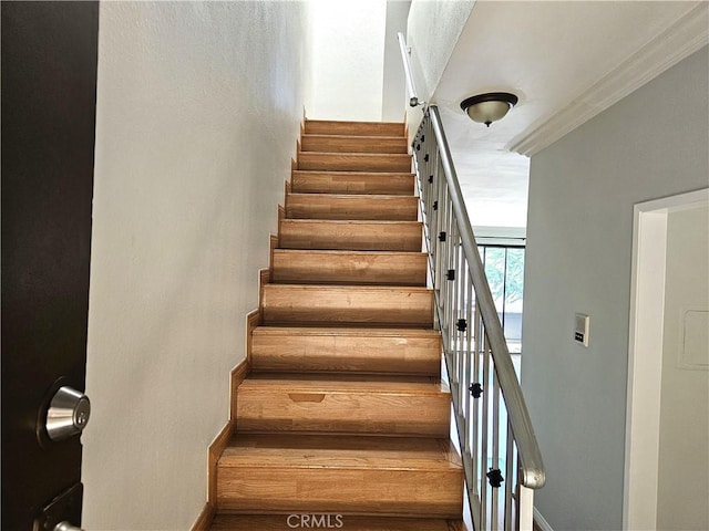 6801 Mammoth Ave Unit 6, Van Nuys, CA 91405 - staircase with baseboards and ornamental molding