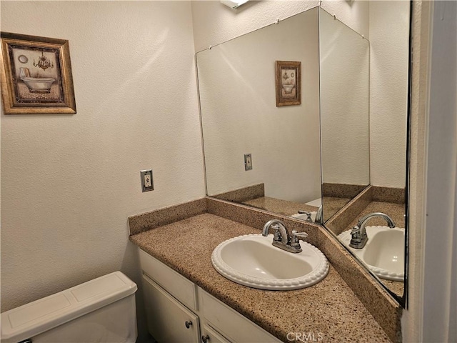 6801 Mammoth Ave Unit 6, Van Nuys, CA 91405 - bathroom with vanity and a textured wall