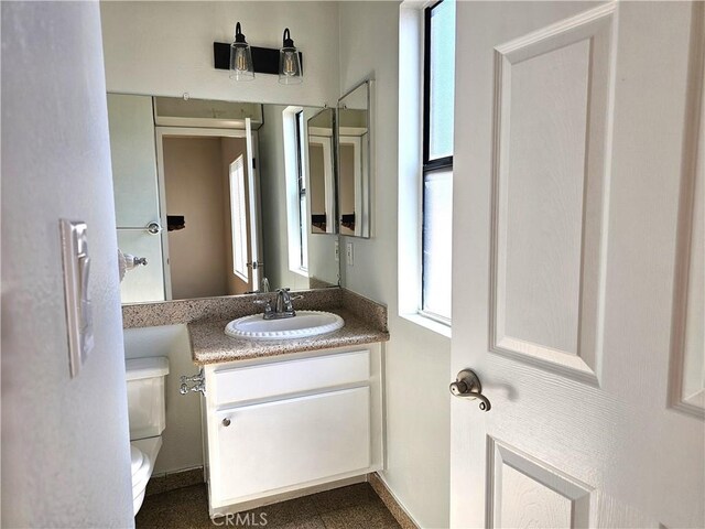 6801 Mammoth Ave Unit 6, Van Nuys, CA 91405 - bathroom with toilet and vanity