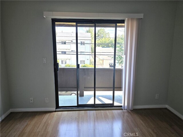 6801 Mammoth Ave Unit 6, Van Nuys, CA 91405 - spare room featuring wood finished floors