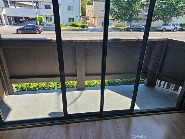 6801 Mammoth Ave Unit 6, Van Nuys, CA 91405 - doorway featuring wood finished floors and plenty of natural light