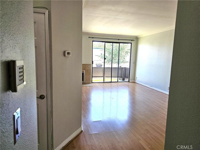 6801 Mammoth Ave Unit 6, Van Nuys, CA 91405 - empty room with ornamental molding and wood finished floors