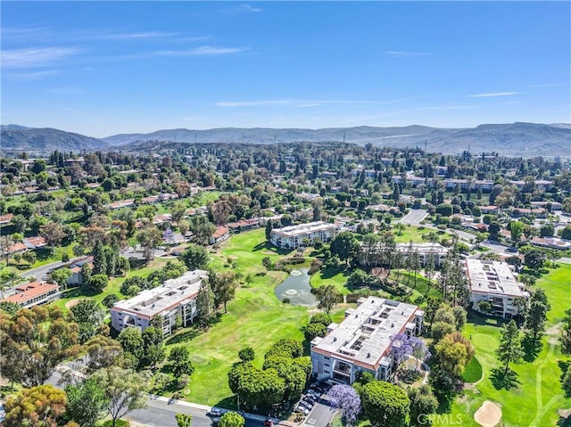 5510 Paseo Del Lago W Unit 2D, Laguna Woods, CA 92637 - drone / aerial view of a local golf course and a mountain backdrop