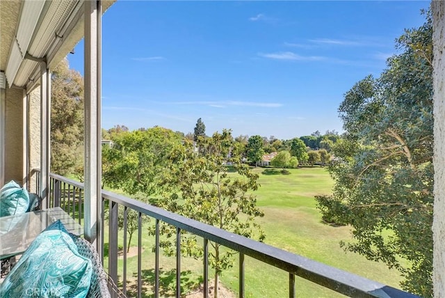 5510 Paseo Del Lago W Unit 2D, Laguna Woods, CA 92637 - balcony featuring view of wooded area