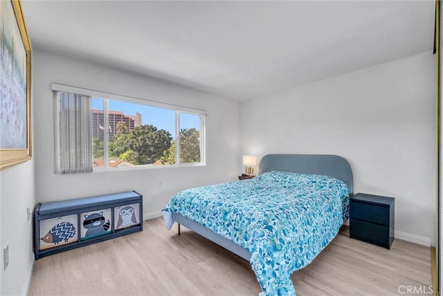 5510 Paseo Del Lago W Unit 2D, Laguna Woods, CA 92637 - bedroom with wood finished floors