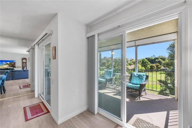 5510 Paseo Del Lago W Unit 2D, Laguna Woods, CA 92637 - doorway with wood finished floors and baseboards