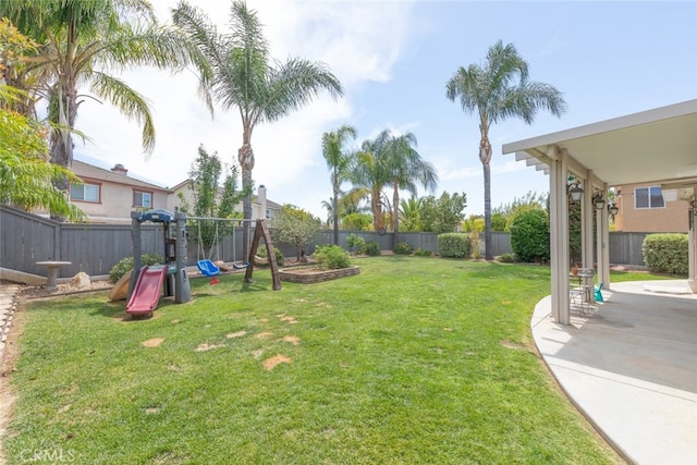 40433 Wgasa Pl, Temecula, CA 92591 - fenced backyard featuring a playground and a patio area